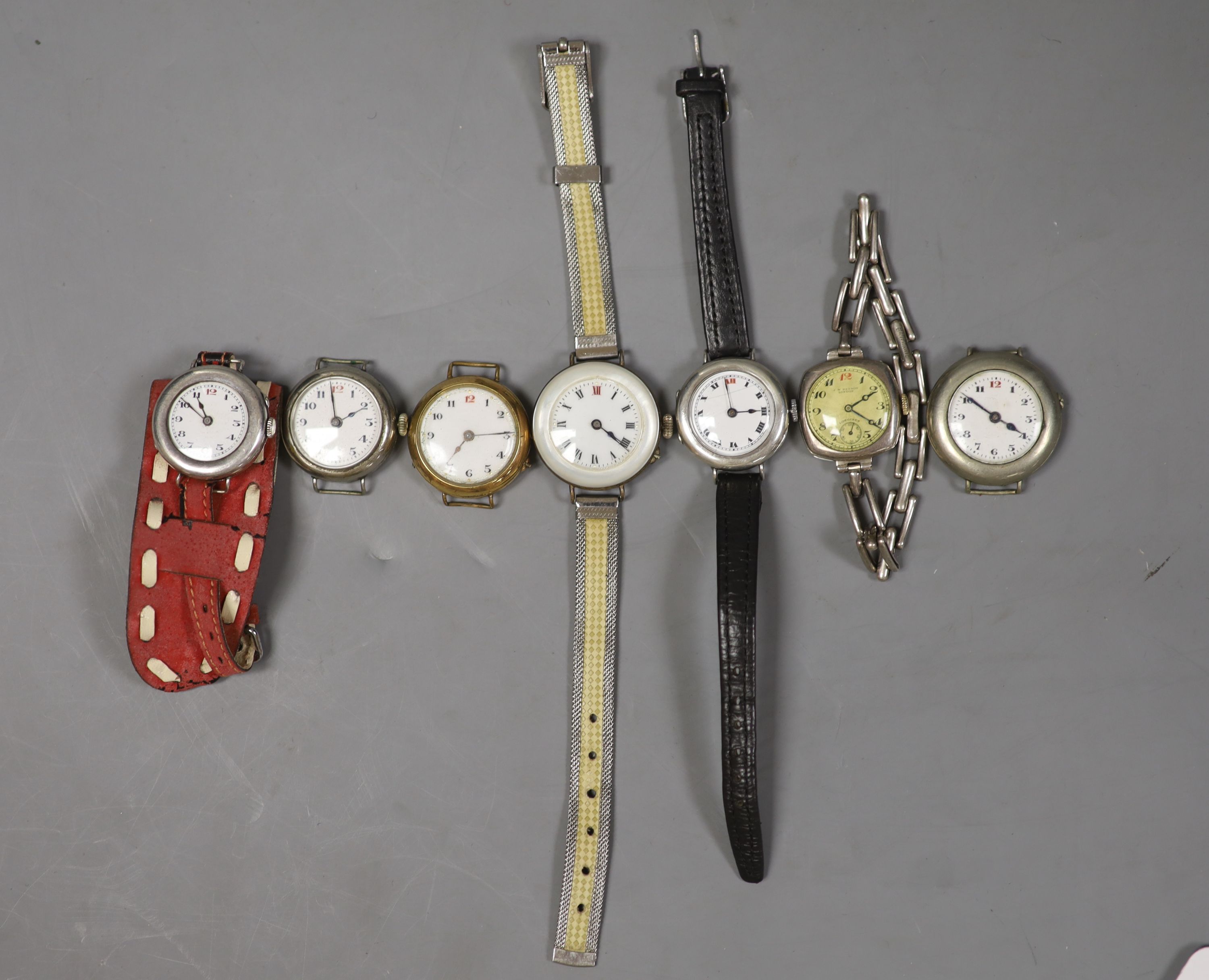 Seven assorted mainly strapless wrist watches, including gold plated and silver cased Longines.